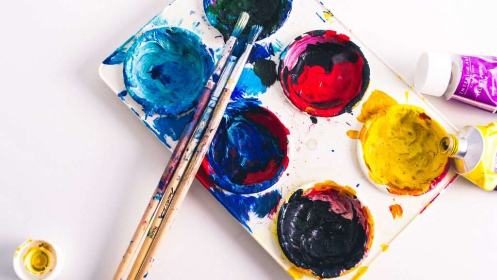 Colourful paint palette in art class